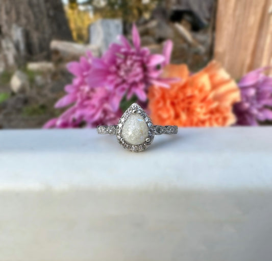 Vintage style pear ring with diamond dust and opal flakes. 